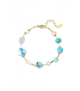 Goudkleurige armband met blauwe kralen - Glamour voor elke outfit